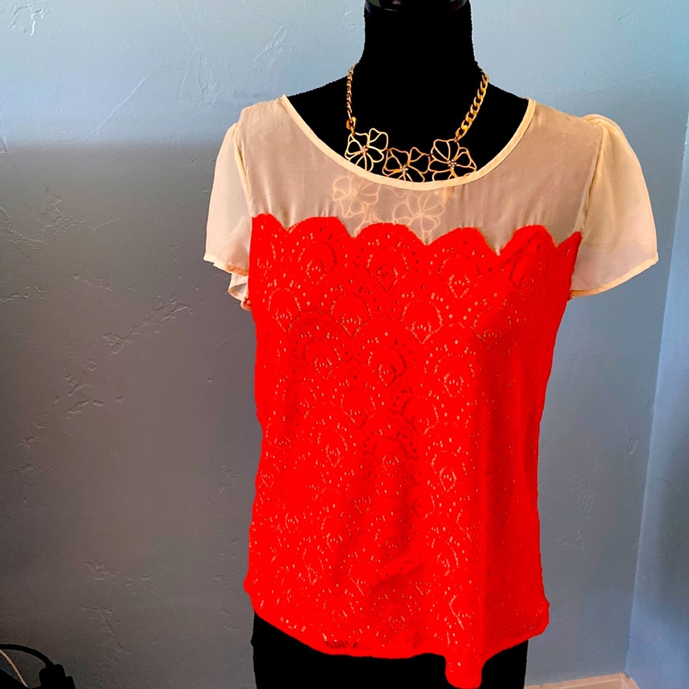 Francesca’s cream & tangerine color top- new with tags size large